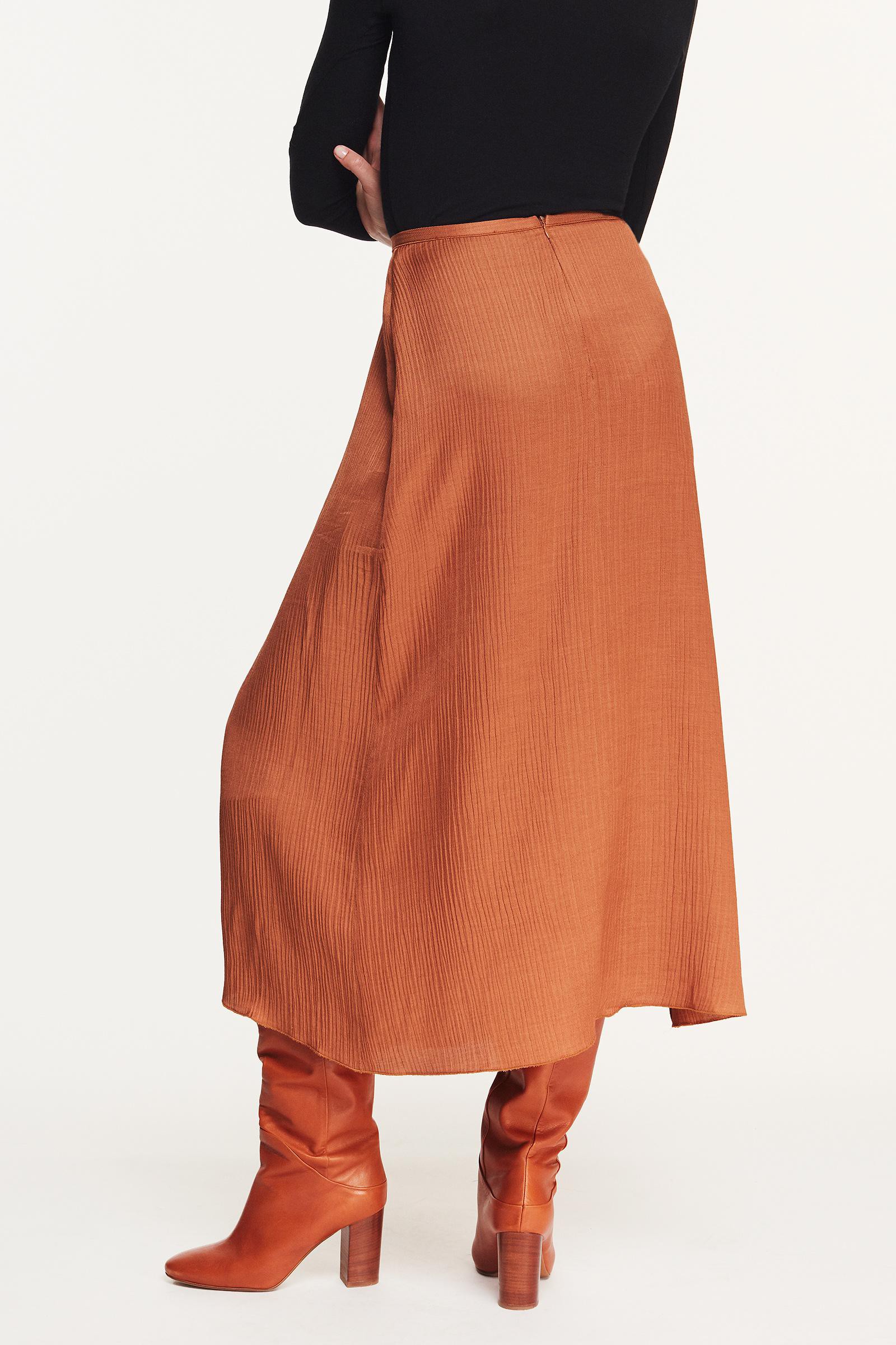 Long skirt with asymmetric hemline